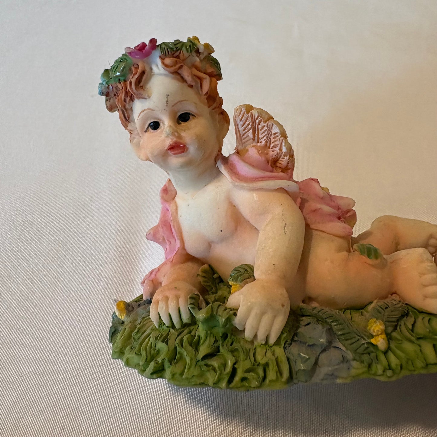 Vintage Cherub Angel Figurine Laying on Grass with Wings & Flower Crown 4" Tall