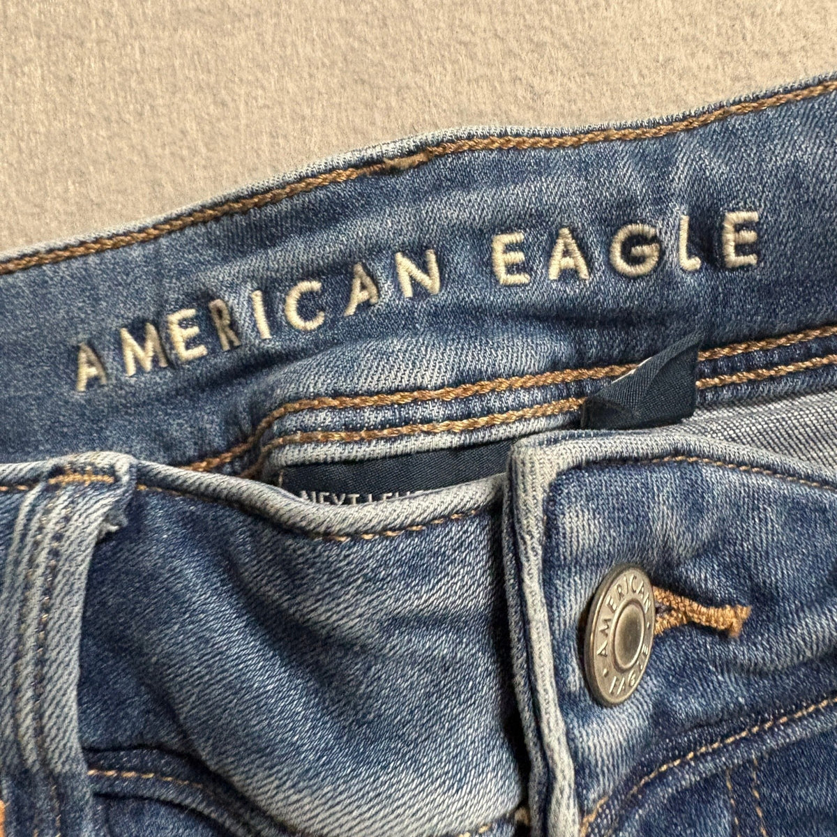 American Eagle Kick Boot Jeans Womens Size 10 Long Next Level Stretch Blue Denim