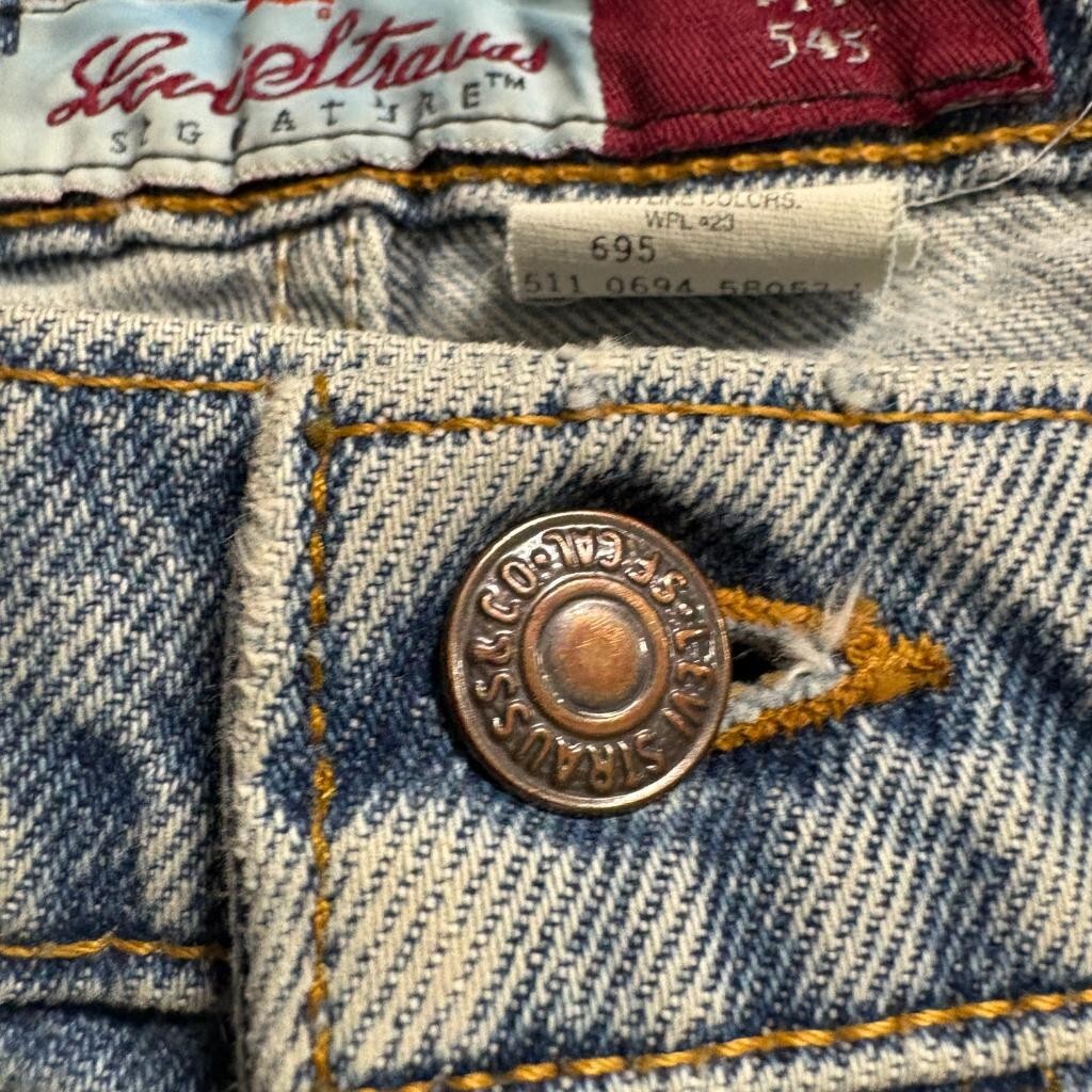 Vintage Levis 545 Orange Tab Jeans Mens 44x32 Made in USA Loose Fit Light Wash