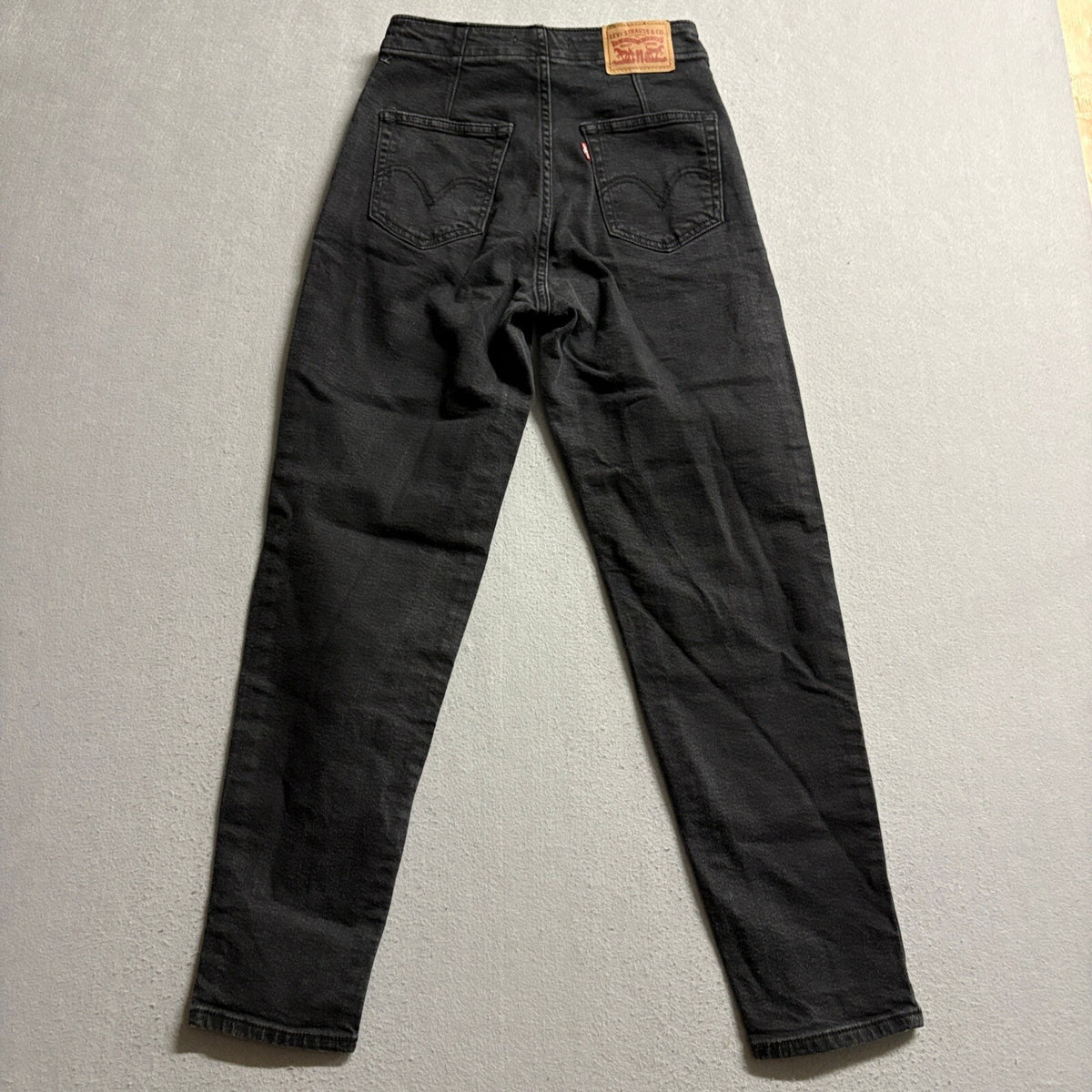 Levis High Waisted Taper Jeans Womens Size 25 W25 L29 Black Pleated Denim