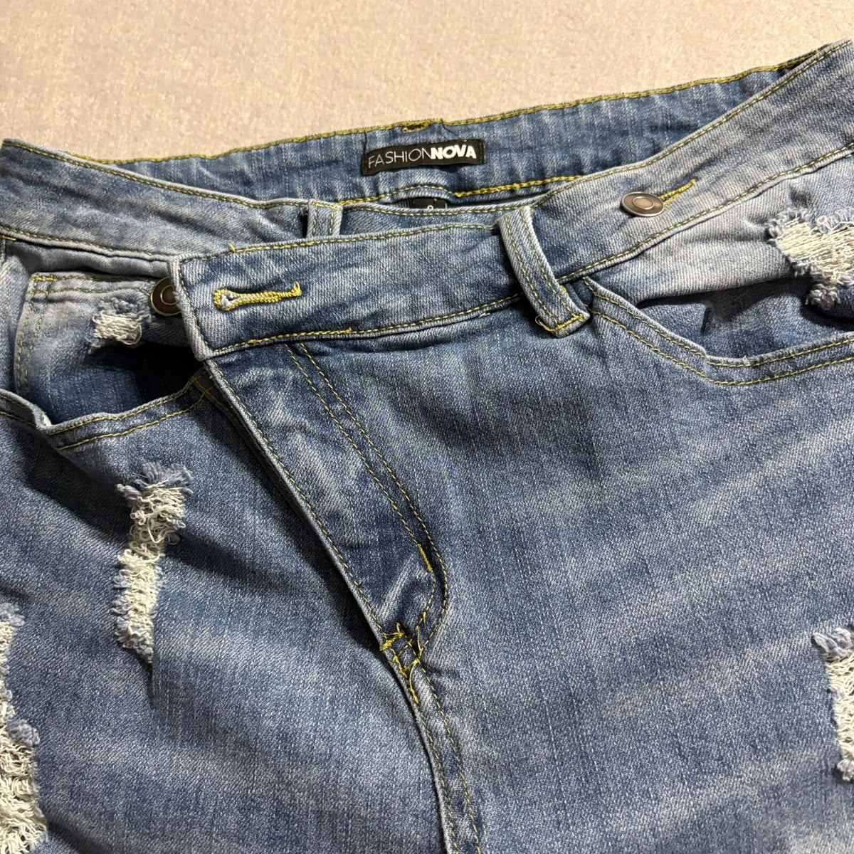 Fashion Nova Distressed Asymmetrical Jeans Womens Size 9 Blue Denim Skinny Leg