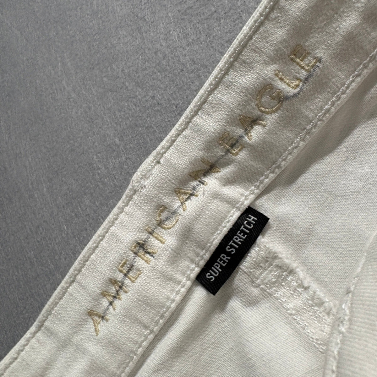 American Eagle Super Stretch Skinny Jeans Womens 12 Regular White Distressed