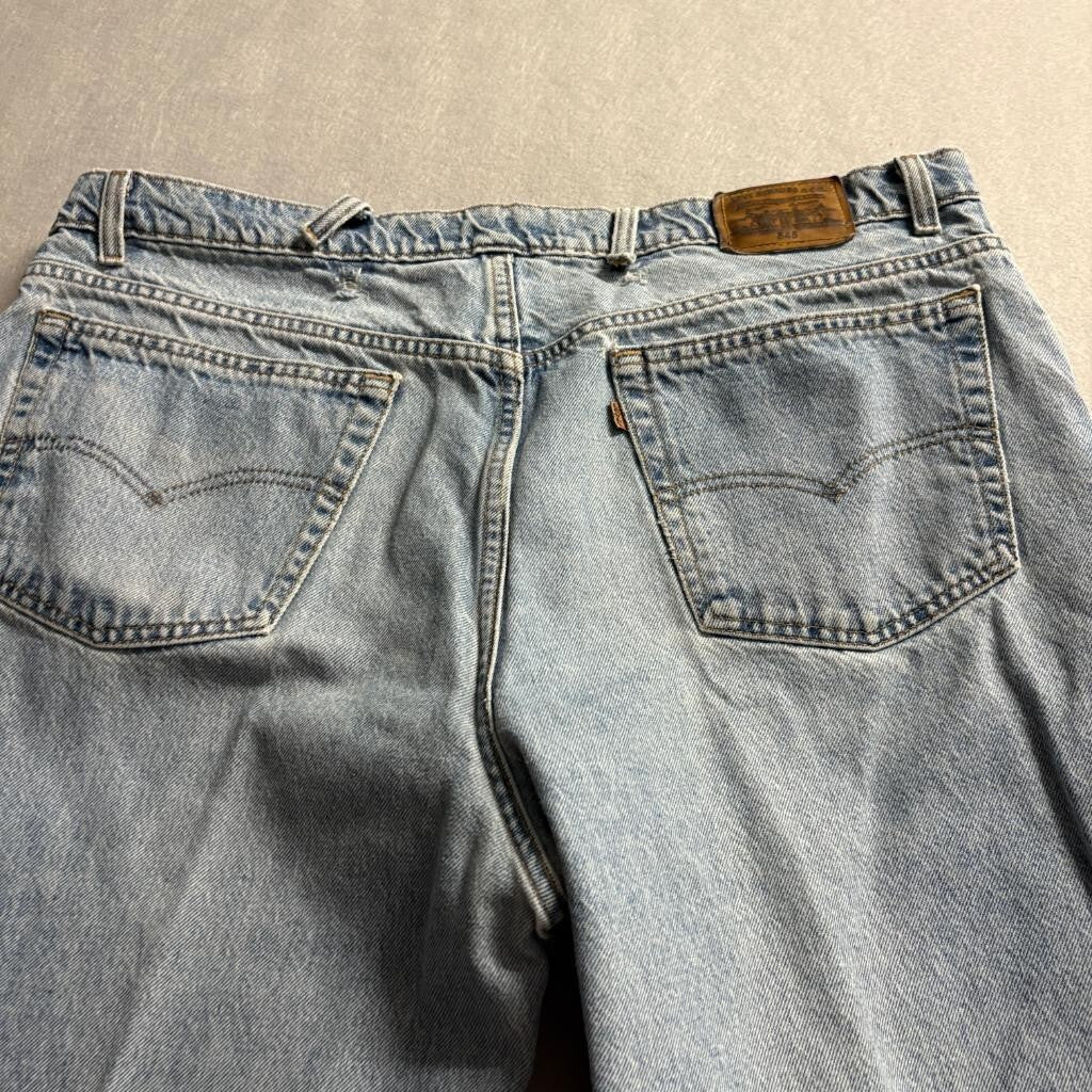 Vintage Levis 545 Orange Tab Jeans Mens 44x32 Made in USA Loose Fit Light Wash