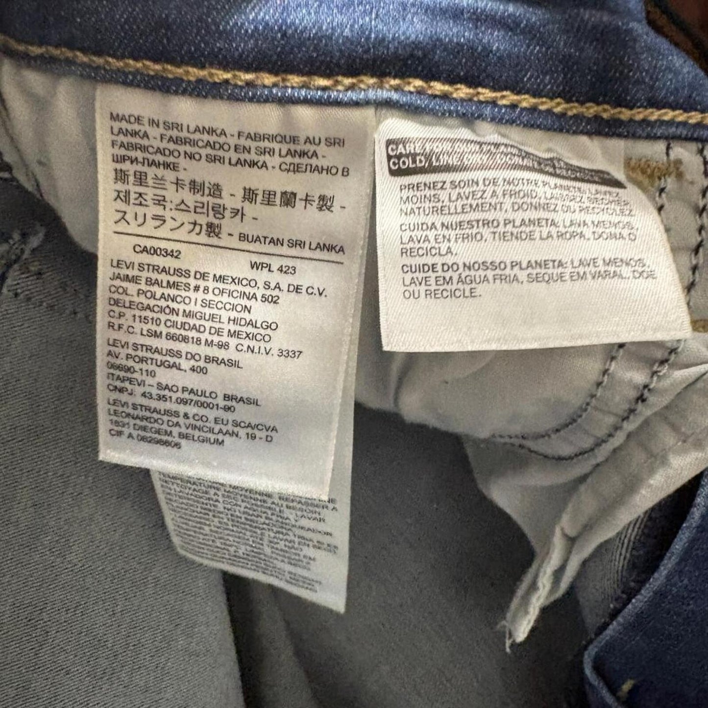 Levi's 720 High Rise Super Skinny Jeans Womens 27x30 Blue Distressed Raw Hem