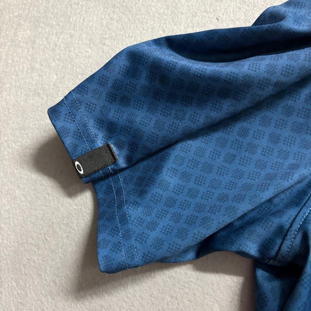 Oakley Golf Polo Shirt Mens XL Blue Geometric Pattern Short Sleeve Athletic