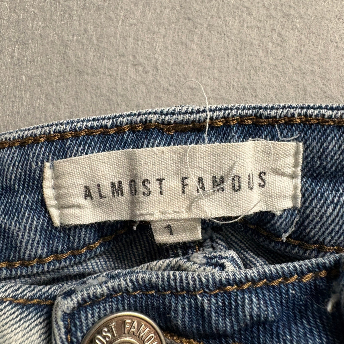 Almost Famous Two Tone Split Color Distressed Jeans Womens Size 1 High Rise Hem