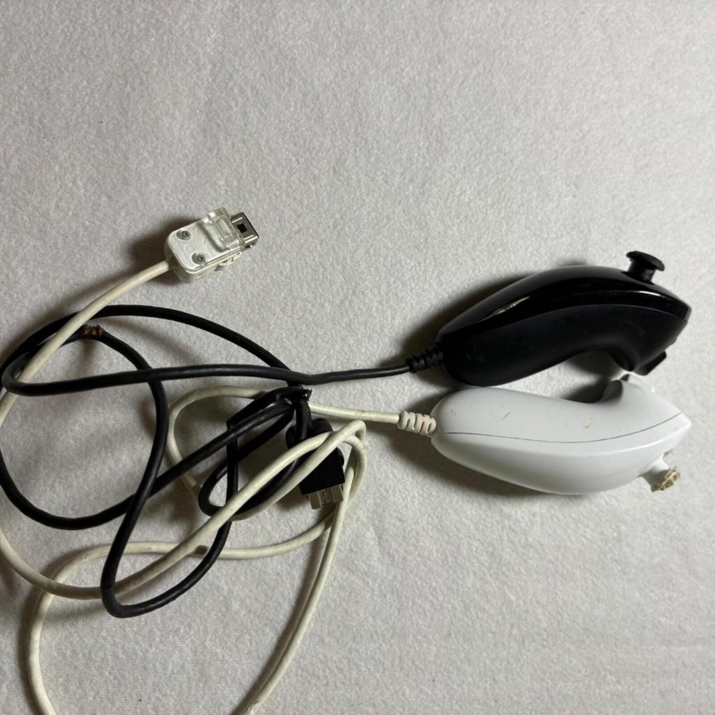 Nintendo Wii Nunchuck Controllers Black and White Lot of 2 Damaged For Parts