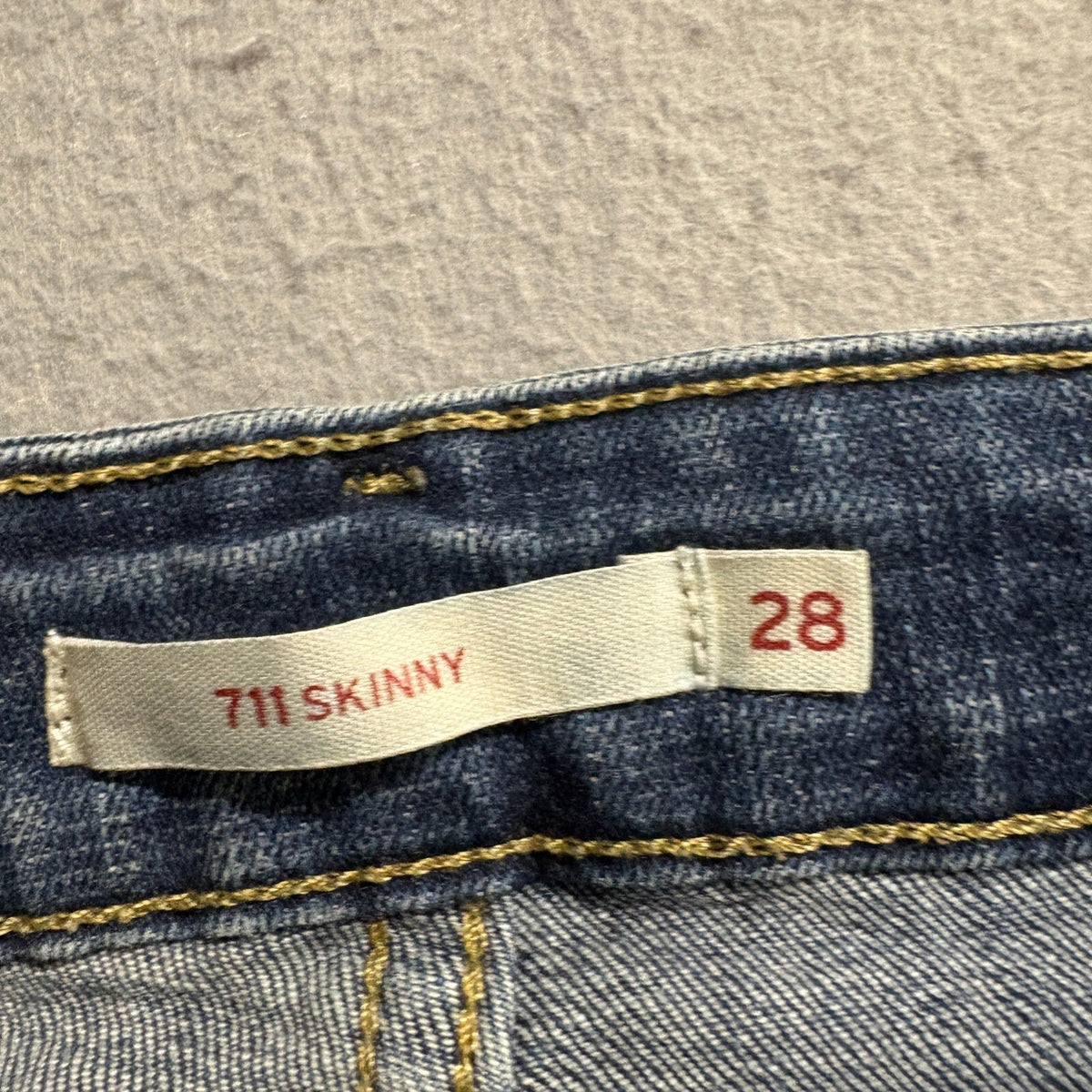 Levi's 711 Skinny Jeans Women's 28 Blue Distressed Knee Raw Hem Denim Pants