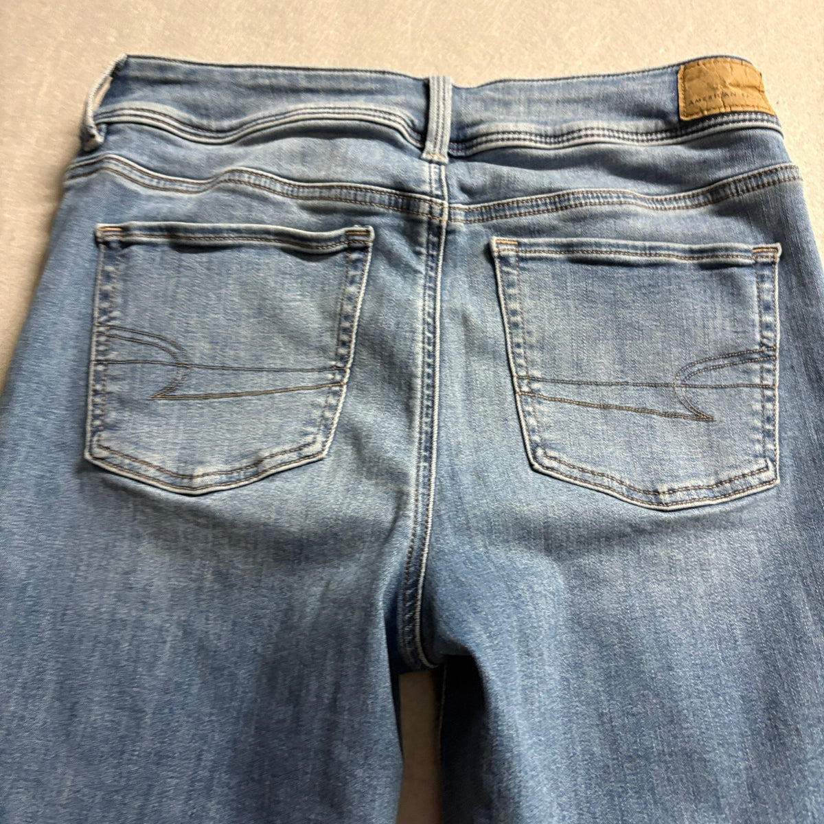 American Eagle Kick Boot Jeans Womens Size 10 Long Next Level Stretch Blue Denim