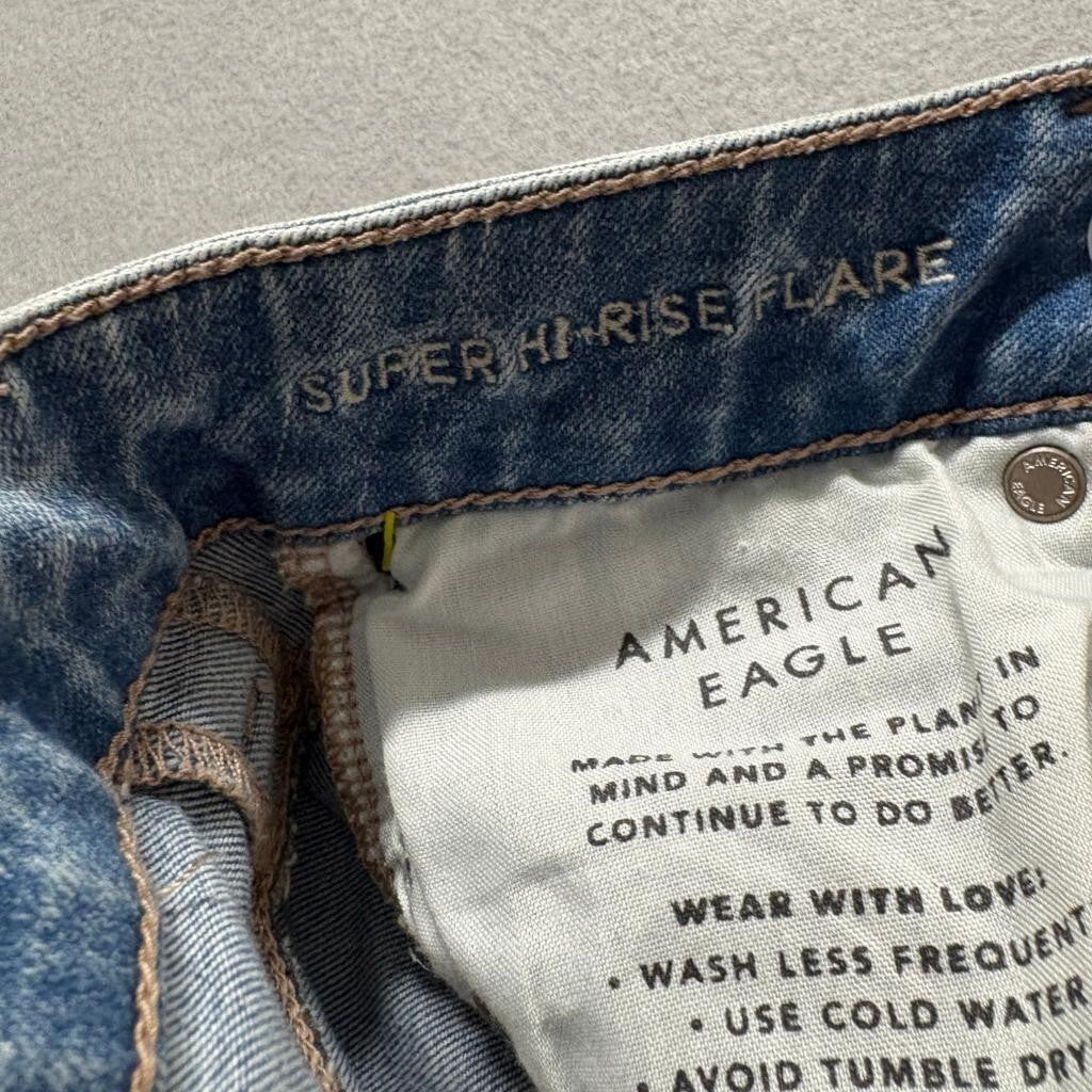 American Eagle Super Hi-Rise Flare Jeans Womens 00 Next Level Stretch Distressed