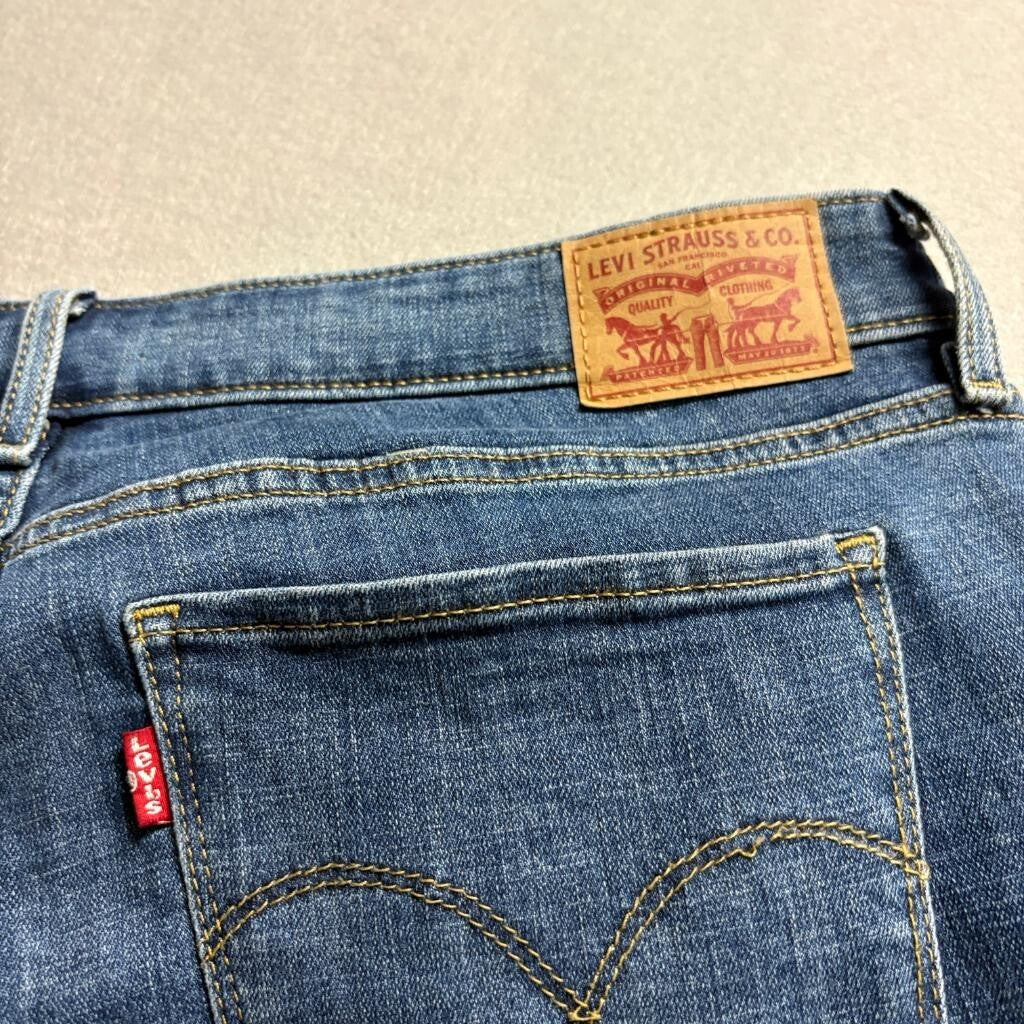 Levis 711 Skinny Ankle Jeans Womens 33 Distressed Ripped Knee Frayed Hem Blue