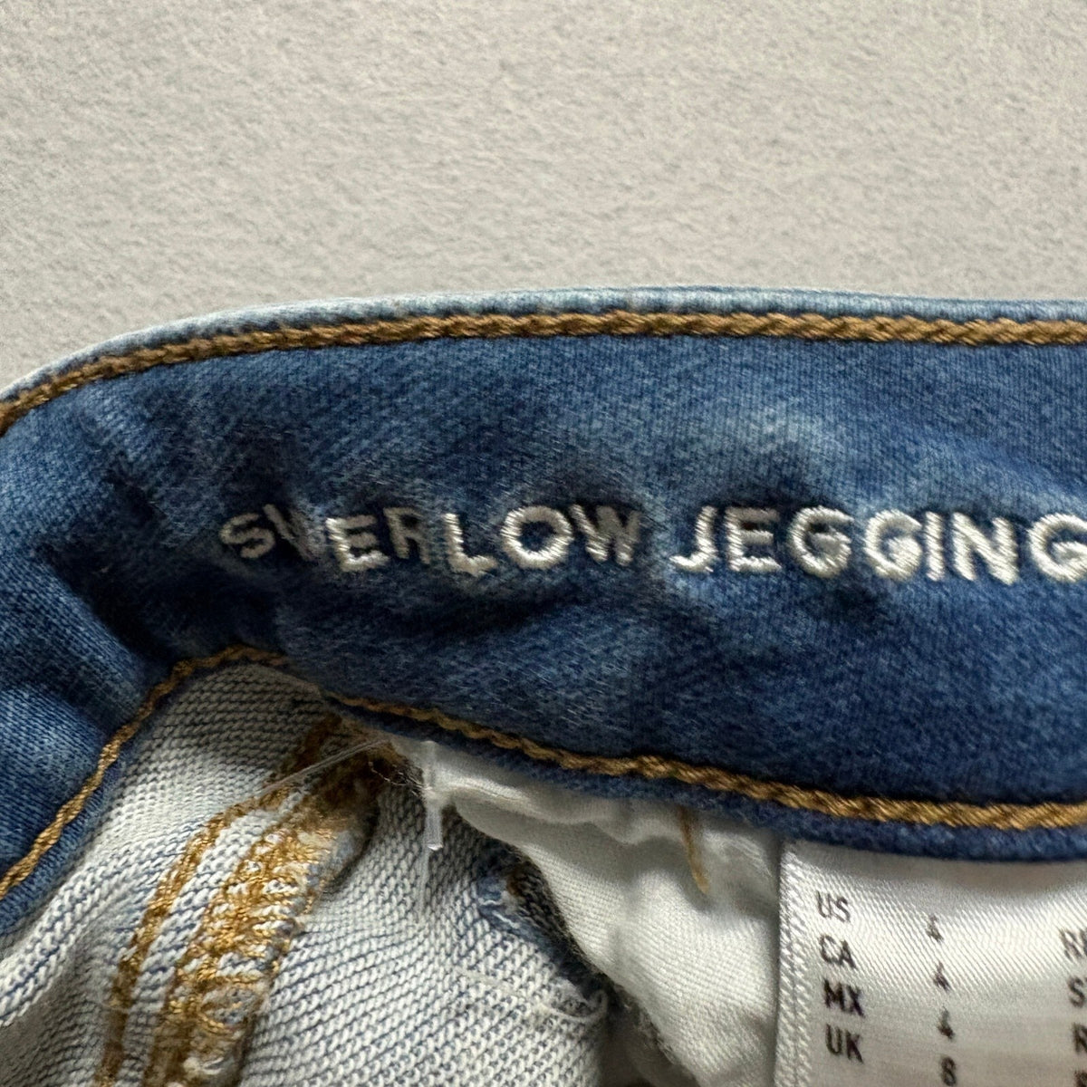 American Eagle Super Low Jegging Jeans Womens 4 Blue Distressed Raw Hem Stretch