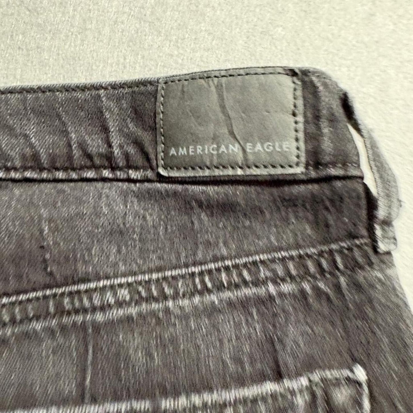 American Eagle Low Rise Baggy Flare Jeans Womens 10 Long Black Distressed
