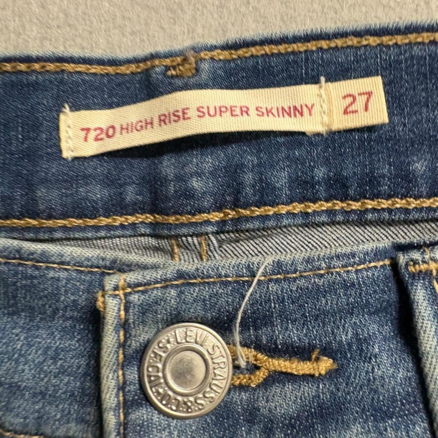Levi's 720 High Rise Super Skinny Jeans Womens 27x30 Blue Distressed Raw Hem