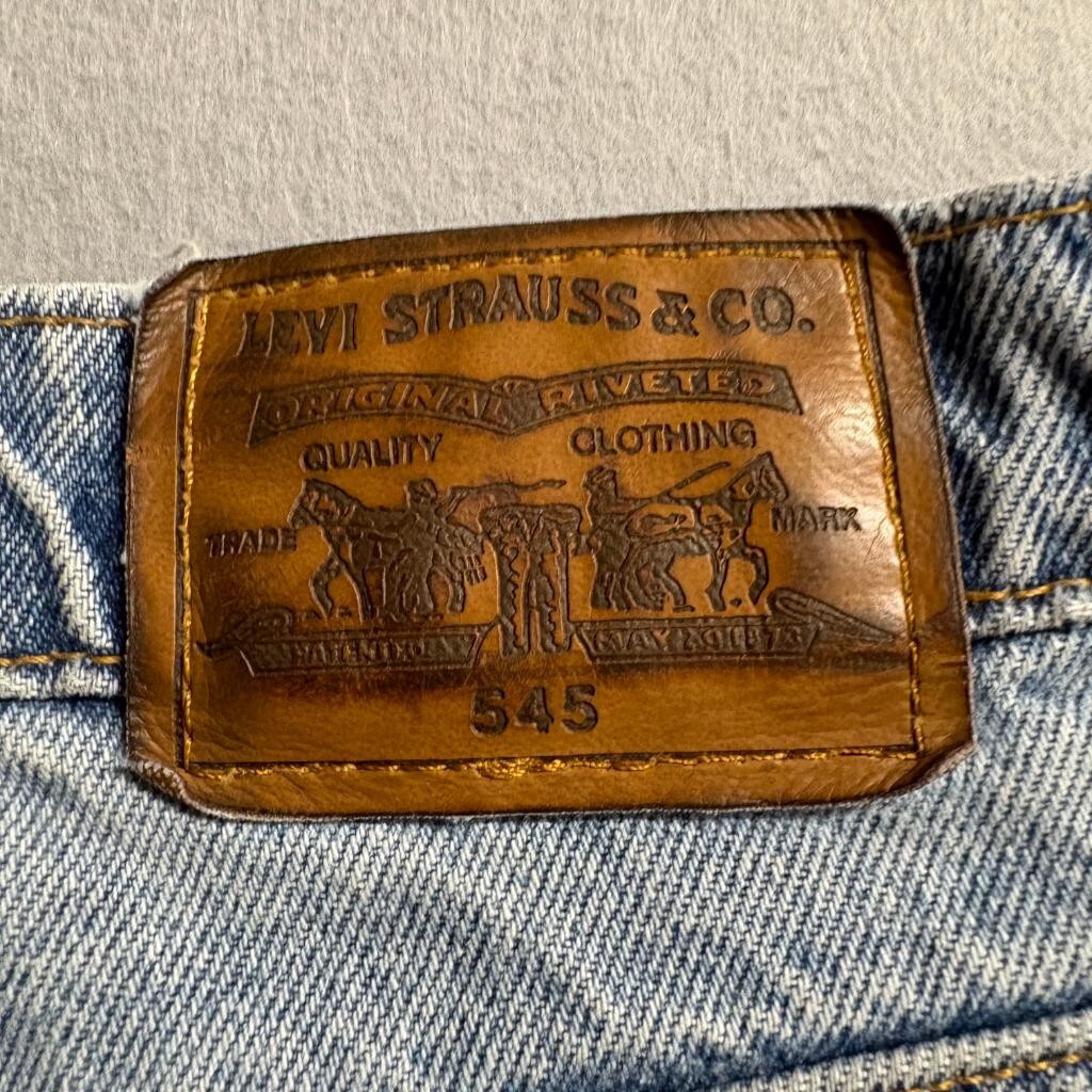 Vintage Levis 545 Orange Tab Jeans Mens 44x32 Made in USA Loose Fit Light Wash