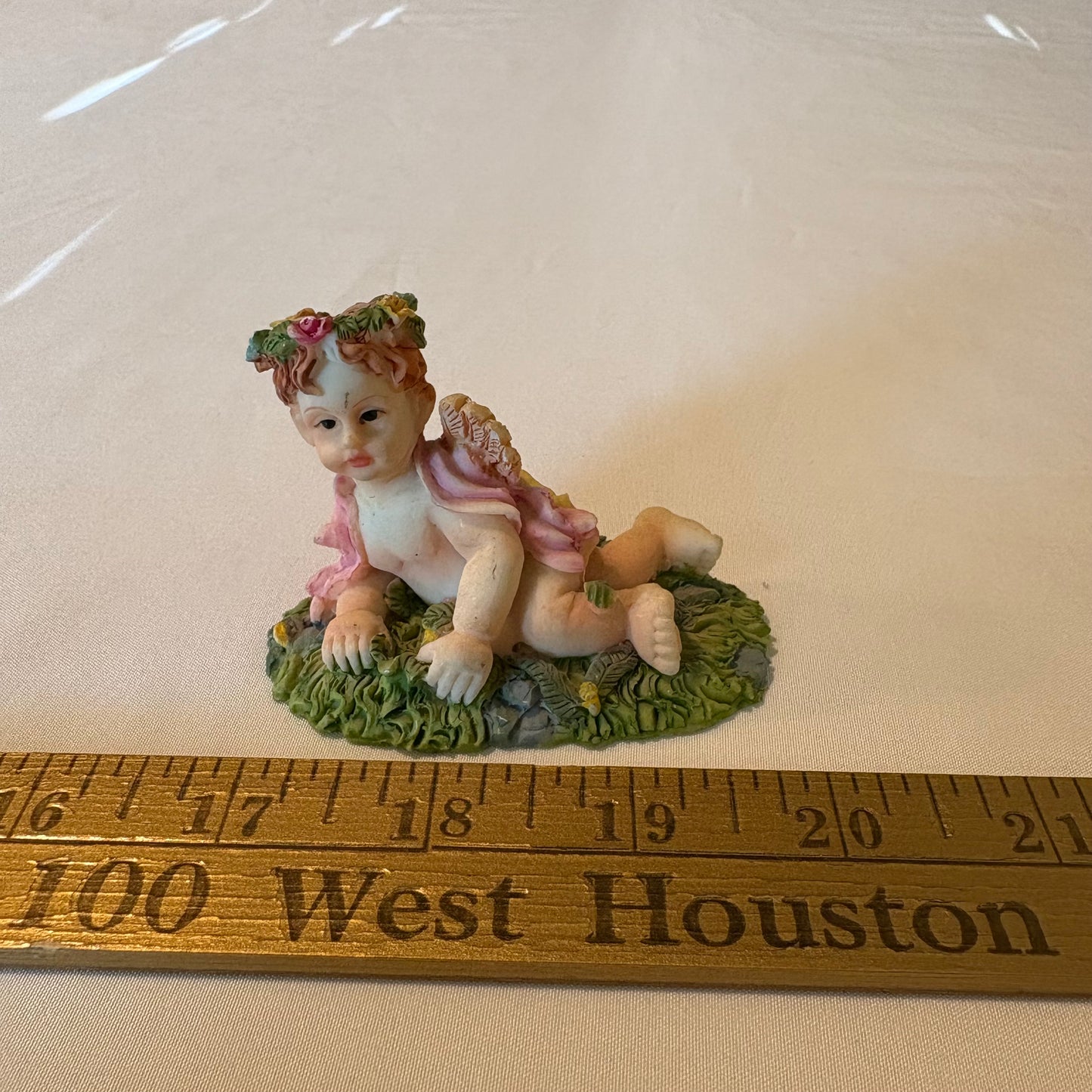 Vintage Cherub Angel Figurine Laying on Grass with Wings & Flower Crown 4" Tall