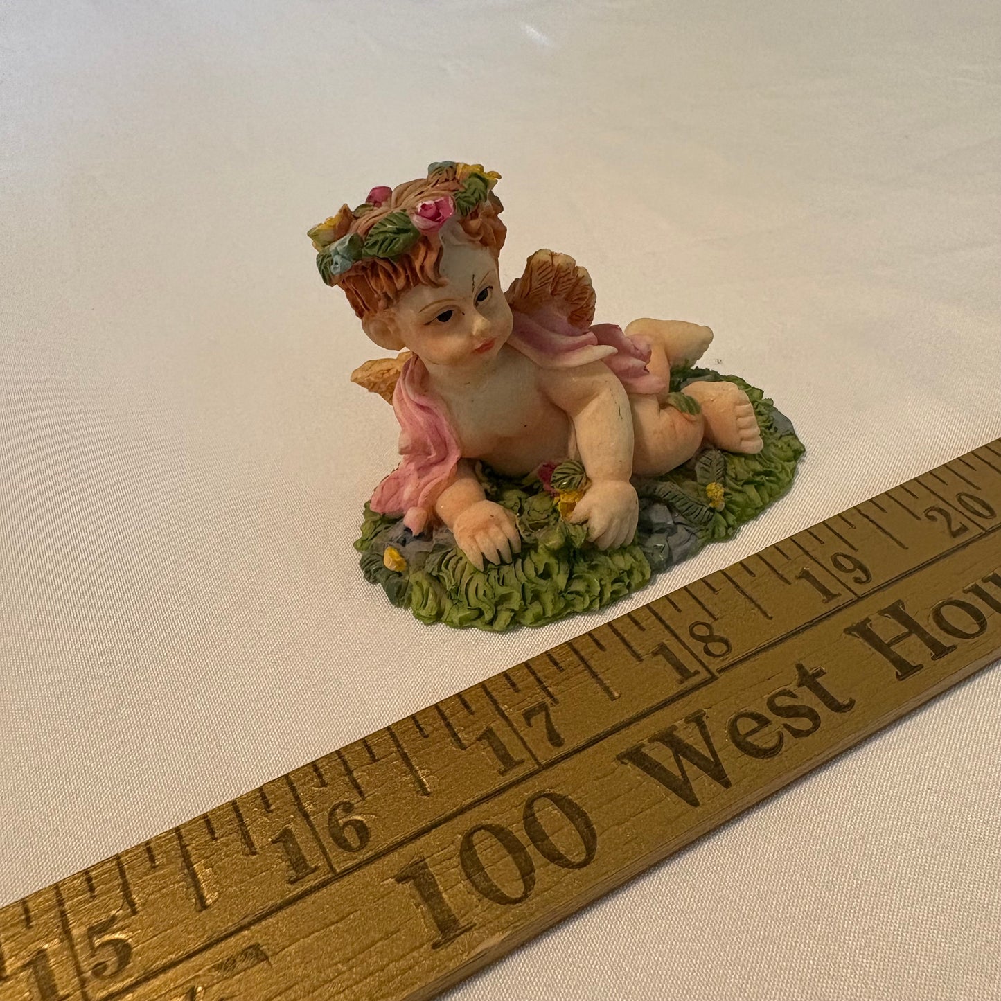 Vintage Cherub Angel Figurine Laying on Grass with Wings & Flower Crown 4" Tall