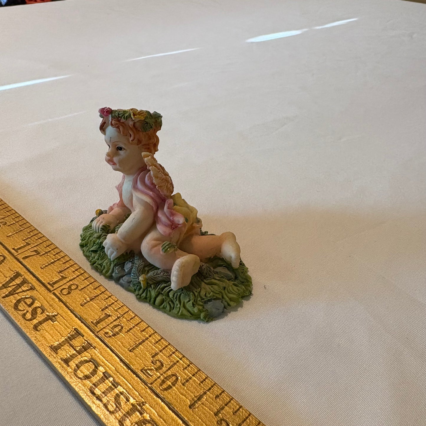 Vintage Cherub Angel Figurine Laying on Grass with Wings & Flower Crown 4" Tall