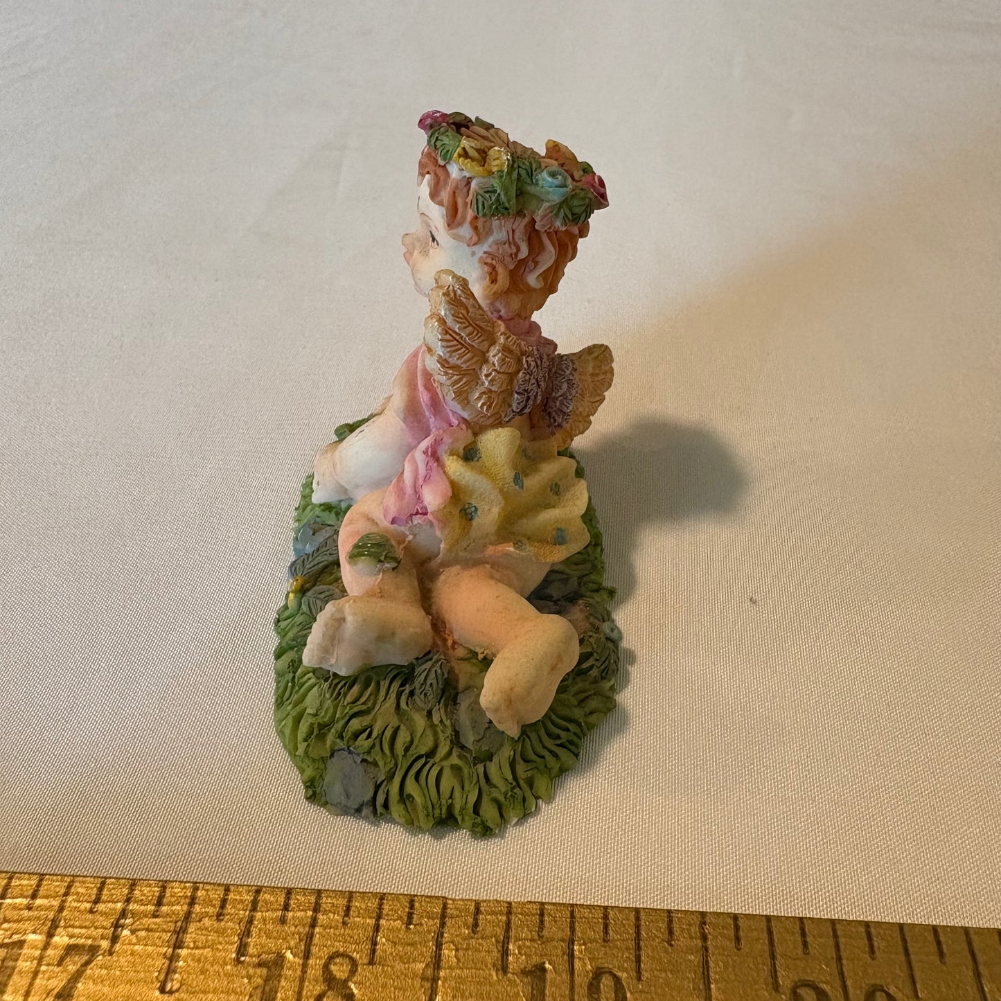 Vintage Cherub Angel Figurine Laying on Grass with Wings & Flower Crown 4" Tall