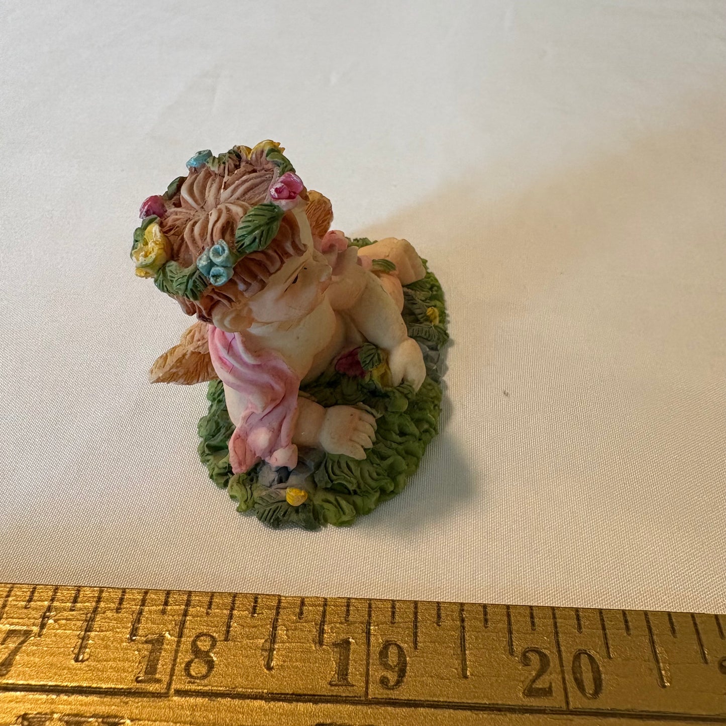 Vintage Cherub Angel Figurine Laying on Grass with Wings & Flower Crown 4" Tall