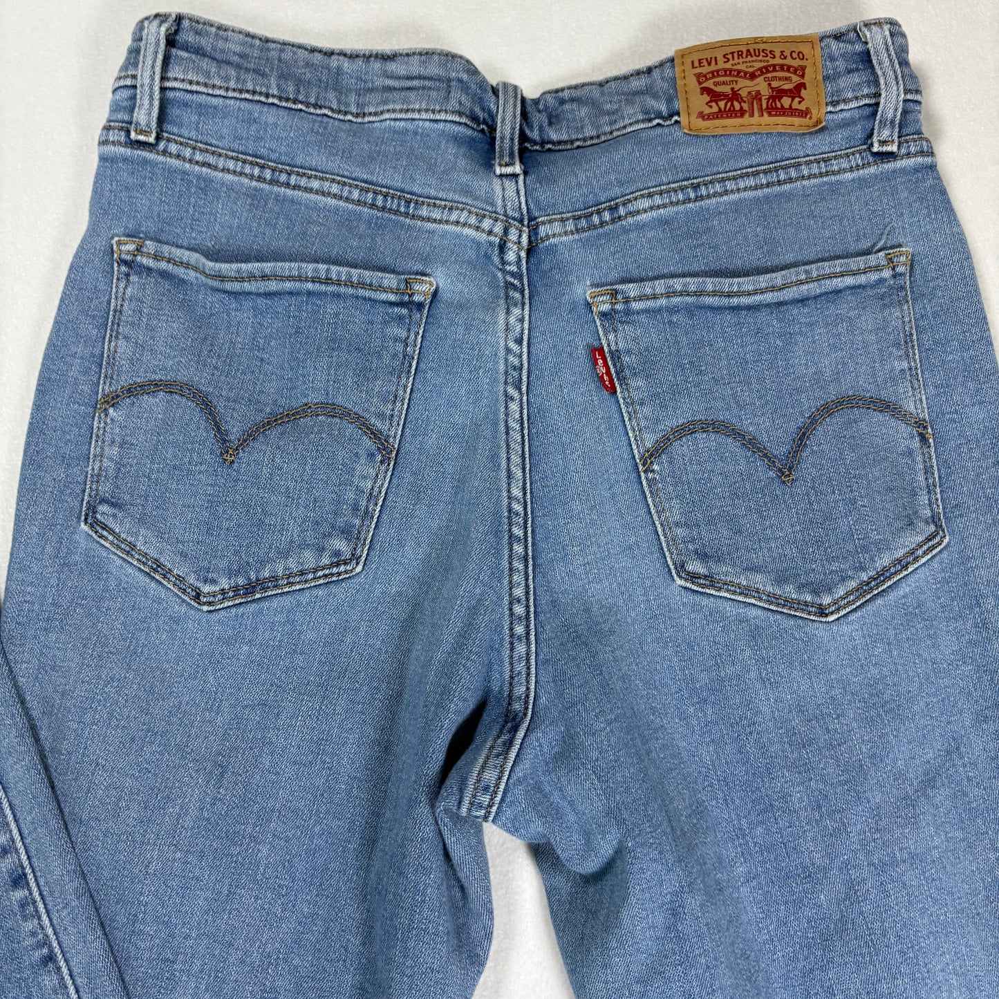 Levis Womens 721 Jeans 29 High Rise Skinny Blue Distressed Hem Stretch Denim