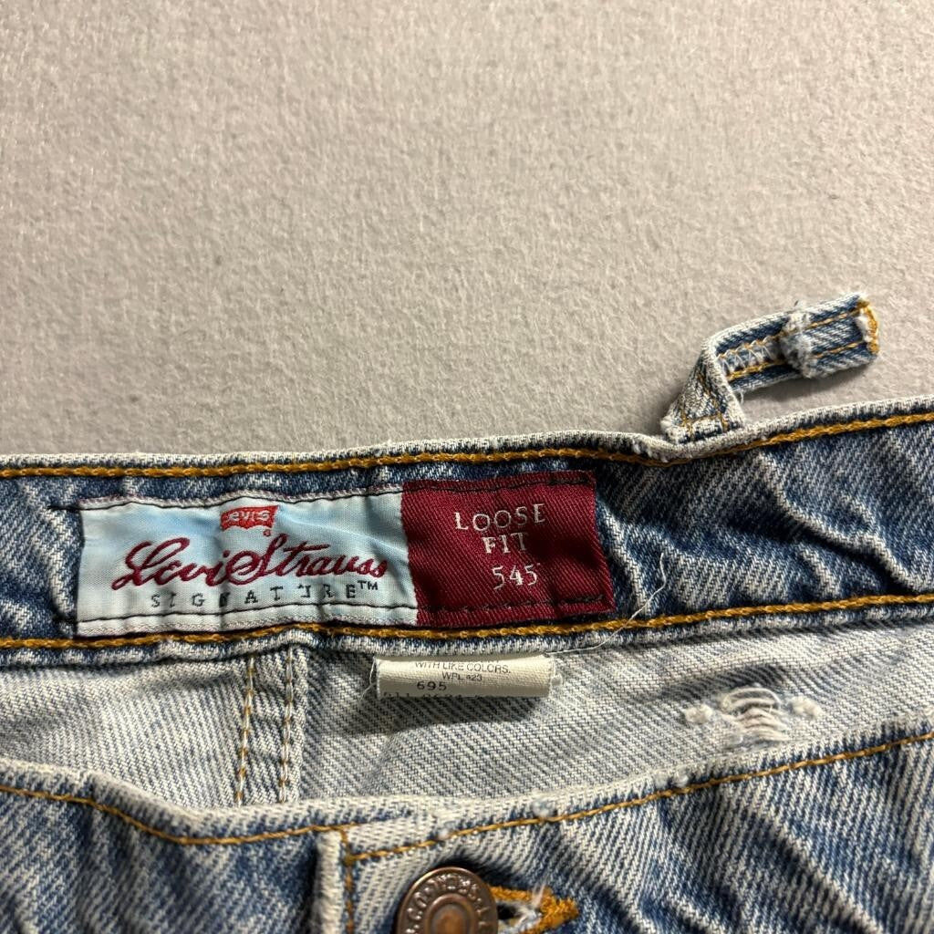 Vintage Levis 545 Orange Tab Jeans Mens 44x32 Made in USA Loose Fit Light Wash