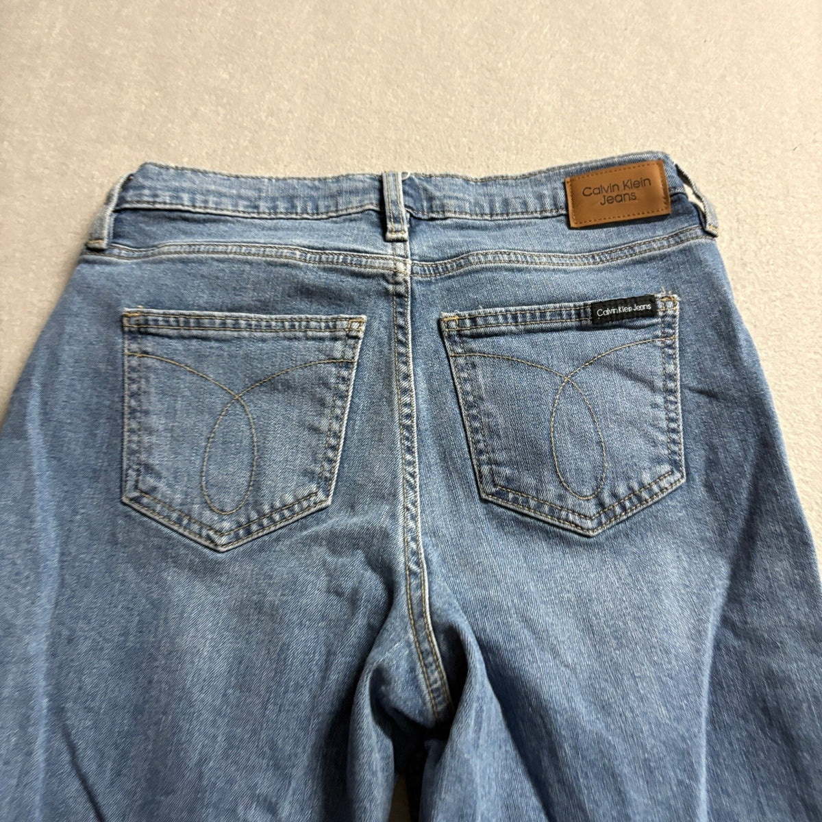 Calvin Klein Jeans Womens Size 2 26 High Rise Straight Leg Raw Hem Blue Denim