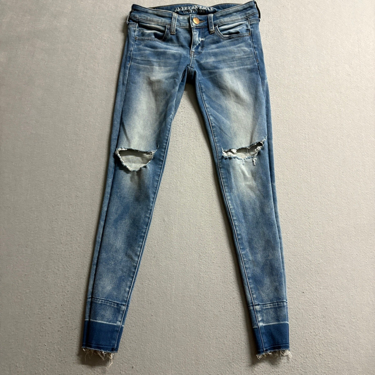American Eagle Super Low Jegging Jeans Womens 4 Blue Distressed Raw Hem Stretch
