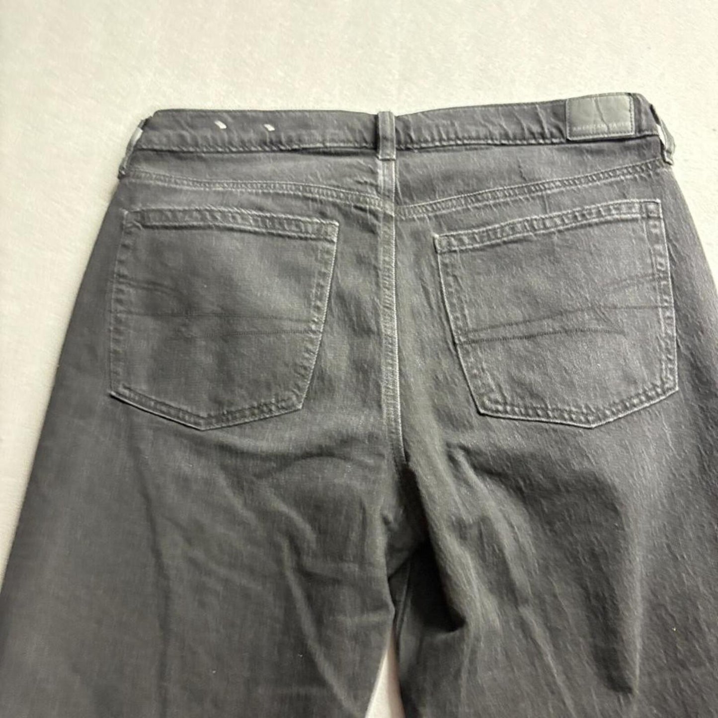 American Eagle Low Rise Baggy Flare Jeans Womens 10 Long Black Distressed