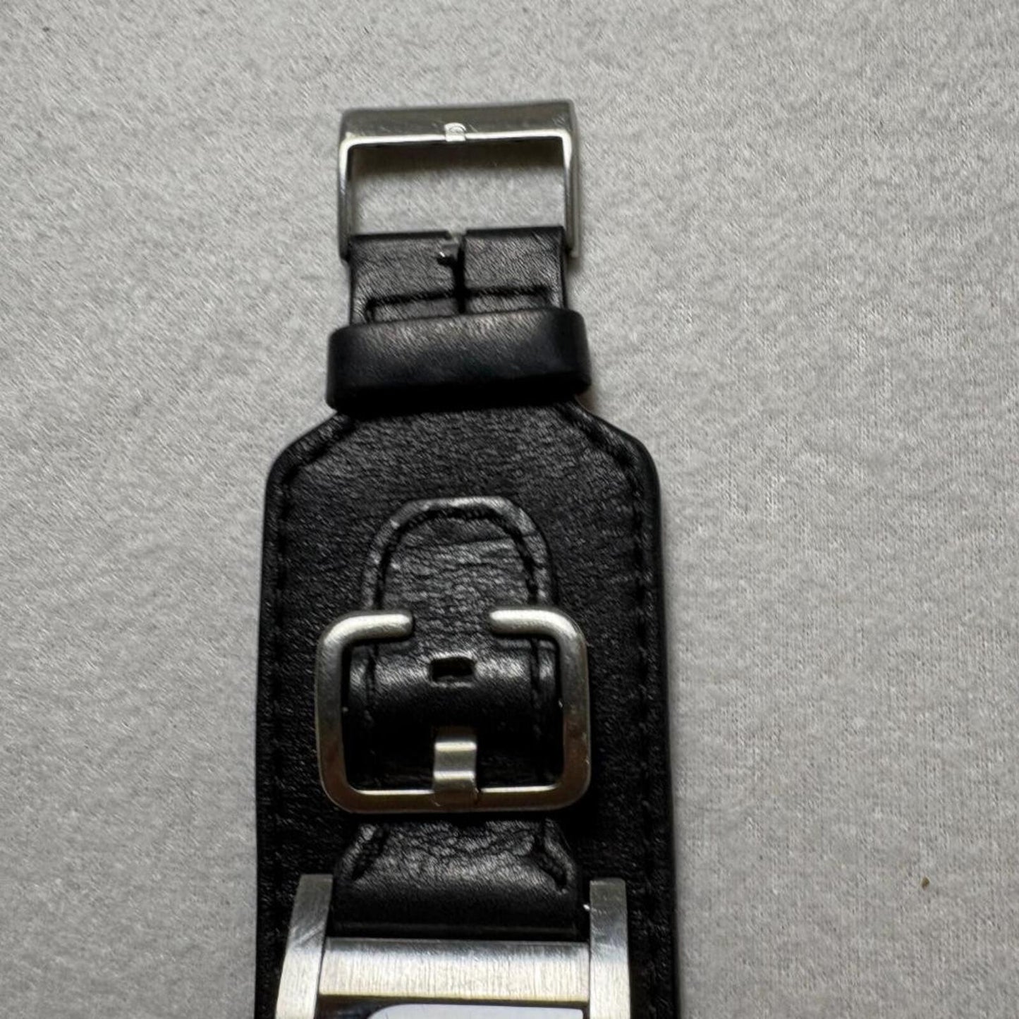 Guess Mens Watch Black Dial Rectangular Silver Case Black Leather Cuff Band