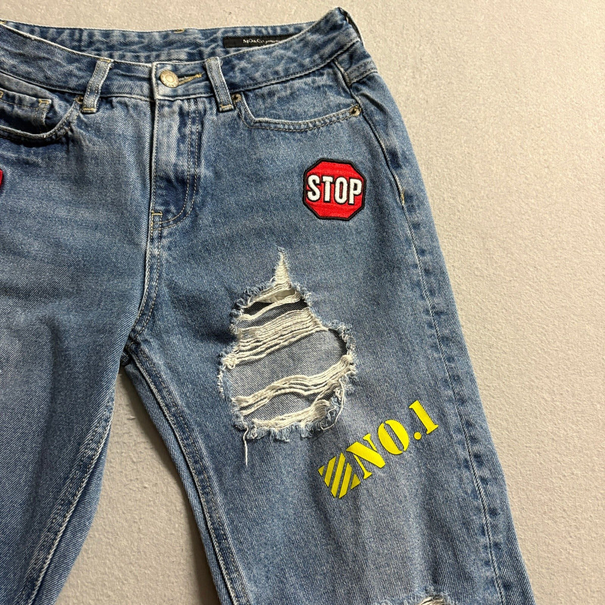 MO&Co Premium Jeans Womens 25 Blue Distressed Ripped Graphic Patch Denim